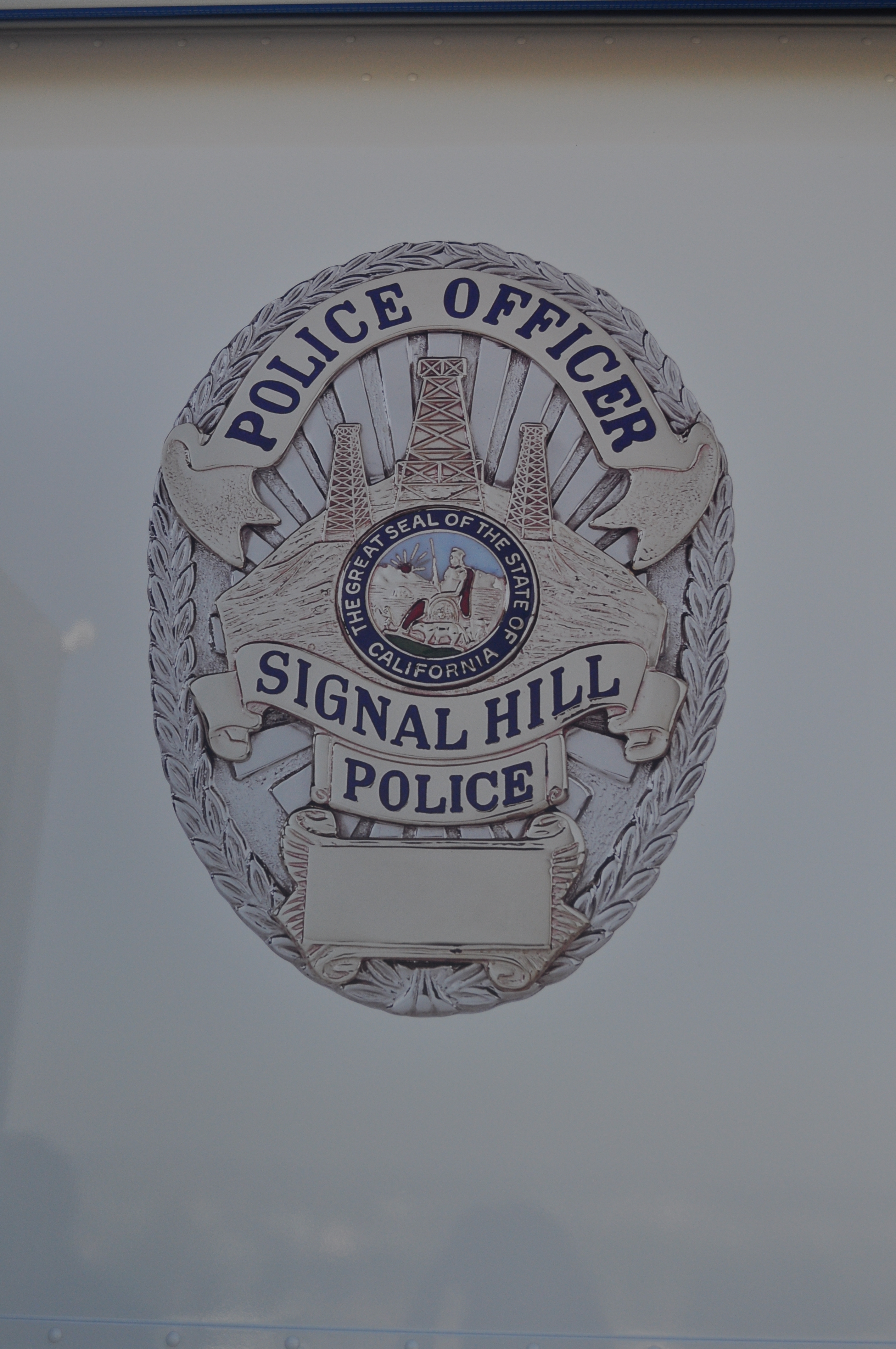 Department badge on a police car